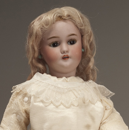 small porcelain doll heads